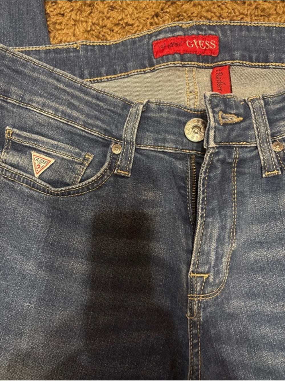 GUESS Men's Faded Blue Slim Jeans with Red Logo Tabs